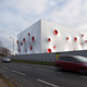 Illustration for article titled Technicolor Bullet Holes Make This the Perfect Home for Olympic Shooting